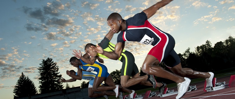 Men running on a track