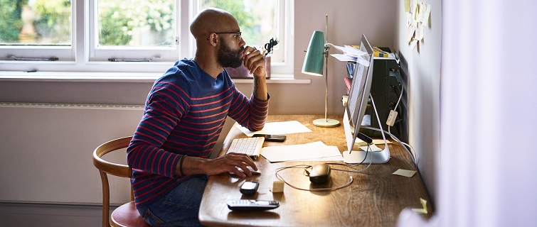 Man working from home computer