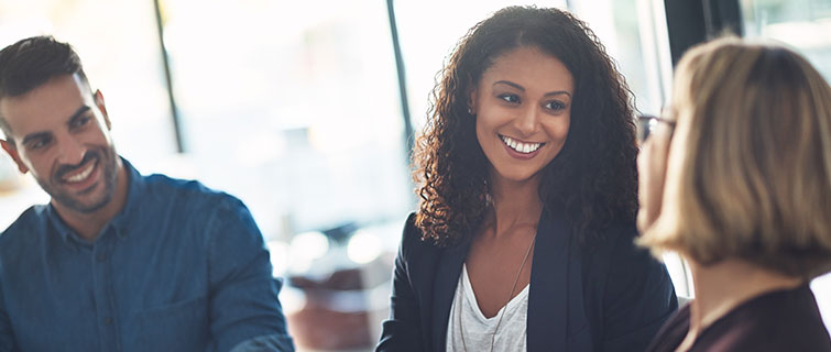 Three people in an interview.