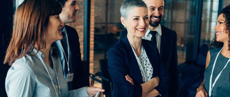 Group of business people discussing at work