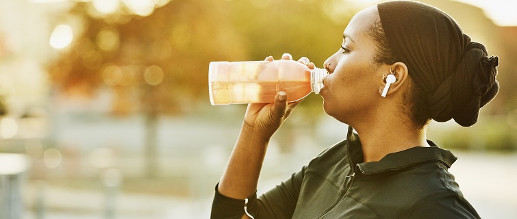 Woman drinking sports drink