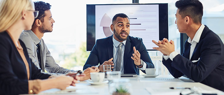 Group of business people at a presentation.