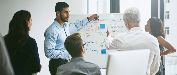 Shot of a group of business colleagues meeting in an office