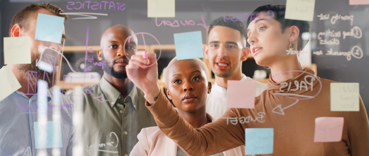 A group of young businesspeople having a brainstorming session.