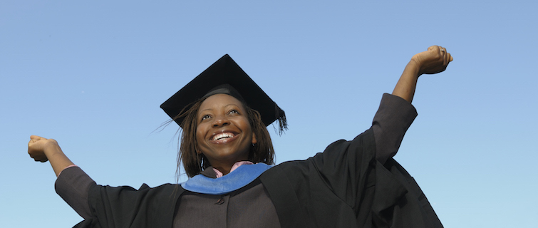 A woman showing her joy at graduating