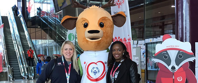 Georgetown students pose with charity with mascot