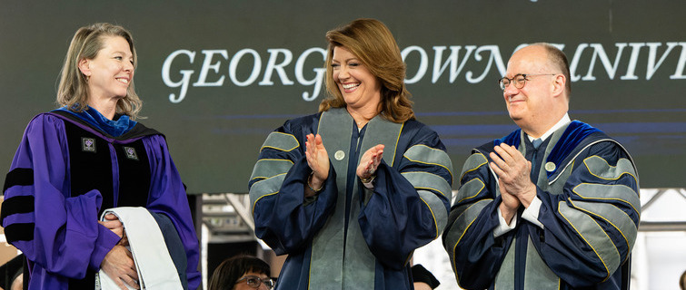 Dean Kelly Otter, Ph.D., Norah O’Donnell, and President John J. DeGioia