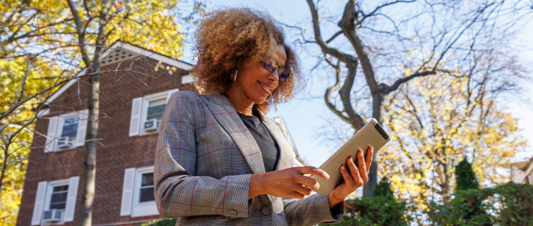 Woman looking at tablet