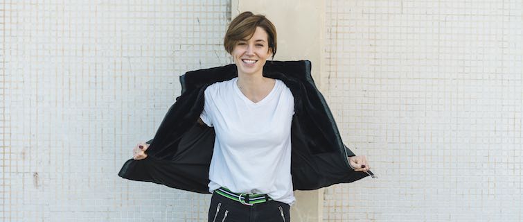 young woman posing for photo