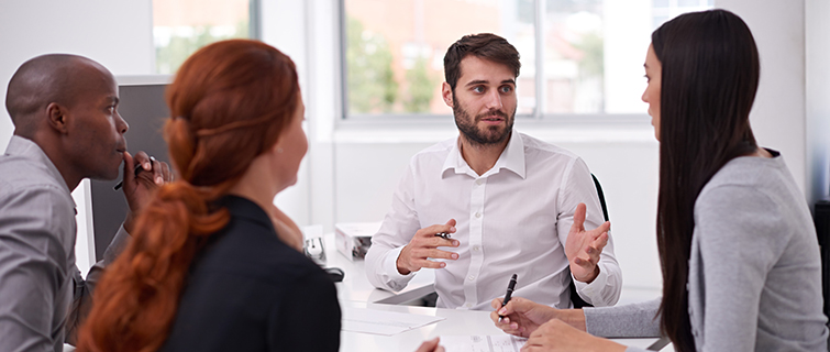 Coworkers engaged in discussion