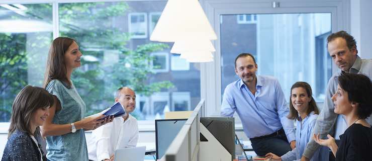 Group of business people engaged in a discussion