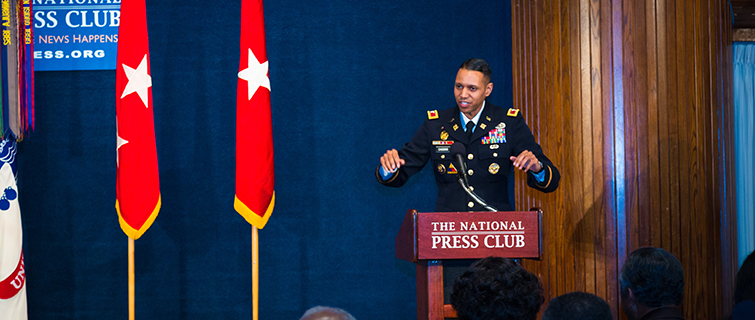 PRCC Alumnus Myles B. Caggins III speaking at an event