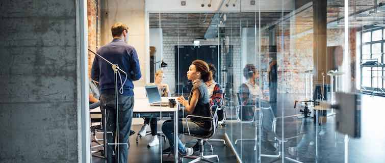 group of workers in a conference room