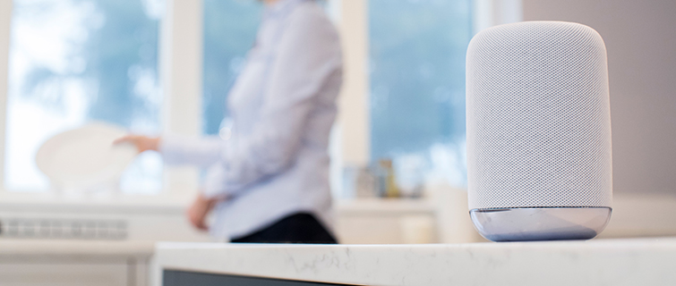 A smart speaker on a kitchen counter