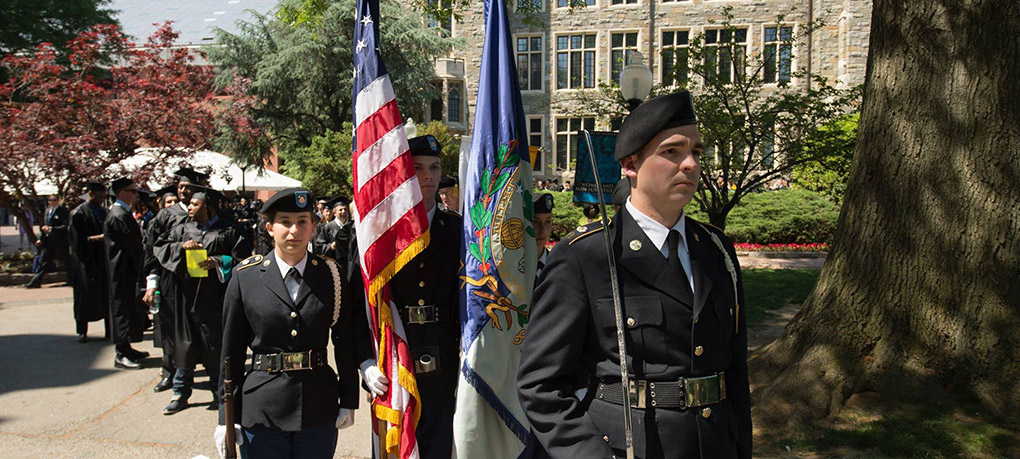 Color guard with flags at SCS Commencement