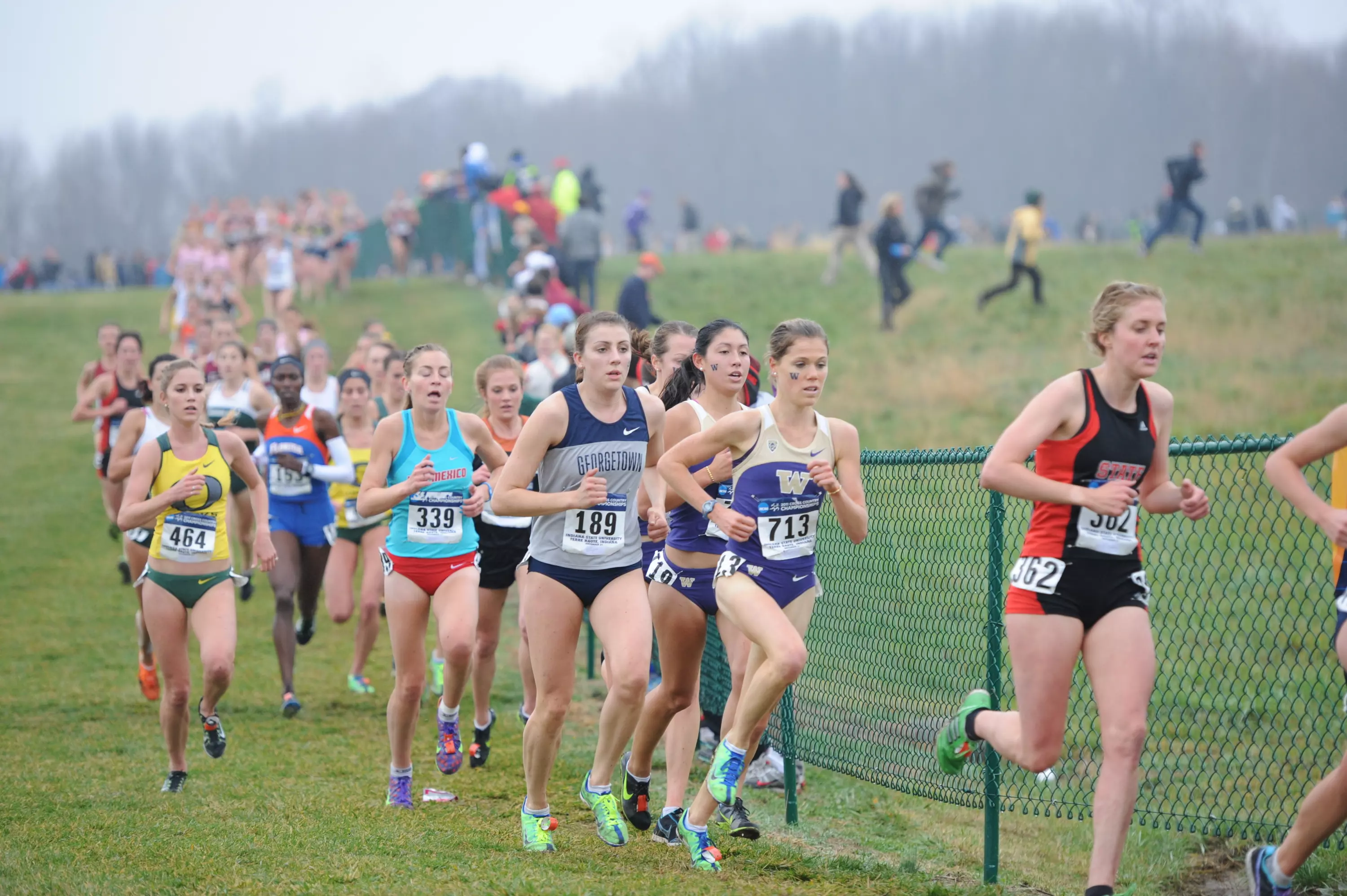 Kirsten Kasper running in a race on a cloudy day.